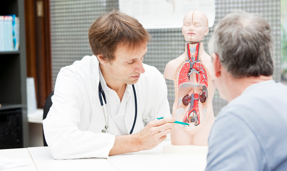 A doctor discusses bladder health with a patient.